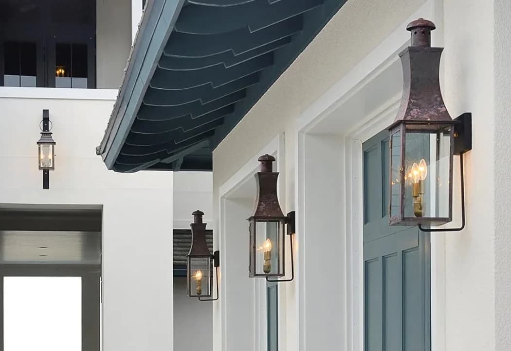 Warm glowing copper lanterns at dusk